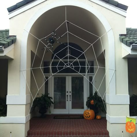 Halloween entry spiderweb Spiderweb Halloween Decoration, Diy Spider Web Outdoor, Diy Giant Spider Web, Diy Spiderweb Decoration Outdoor, Spiderweb Window Decoration, Spiderweb Door Decoration, Diy Large Outdoor Spider Web, Giant Spider Web On House, Dekorasi Halloween