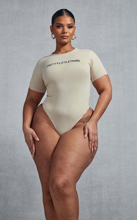 Your basics collection deserves an upgrade and this PrettyLittleThing plus oatmeal short sleeve bodysuit is sure to bring all the style points. It is the perfect piece to bring all the comfy but chic vibes to your look. This bodysuit features an oatmeal material with a contrasting 'PrettyLittleThing' print and short sleeves, what's not to love Team with the matching joggers, gold hoop earrings and your fave chunky trainers for a fresh finish.   Length approx 71cm/28 (Based on a sample size UK 16 Layering Hoodies, Awkward Family Photos, Chic Vibes, Chunky Trainers, Seductive Clothes, Female Rappers, Curvy Women Jeans, Student Fashion, Women Plus Size