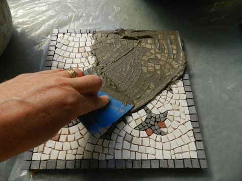 http://blog.mosaicartsupply.com/how-to-fix-grout-mistakes/ NB Vinegar removes tiles from mosaic Diy Mosaic Floor, Grouting Mosaics, Mosaic Techniques, Mosaic Trivet, Mosaics Art, Floor Grout, Mosaic Art Diy, Mosaic Stepping Stones, Mosaic Pots