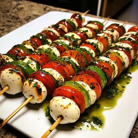 Natashaskitchen | Caprese Skewers are a delightful and visually appealing appetizer that captures the essence of the classic Italian Caprese salad in a fun, bite-sized ... | Facebook Italian Caprese, Italian Caprese Salad, Caprese Skewers, Toy Box, Classic Italian, Bite Size, Caprese Salad, Skewers, Appetizer