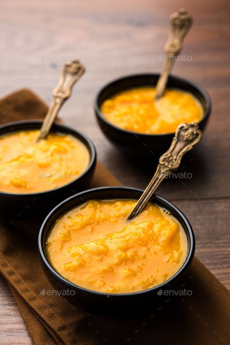 Aamras by stockimagefactory. Mango Pulp or Aam ras or Aamras served in small bowls, selective focus #Sponsored #Pulp, #Aam, #Mango, #Aamras Aam Ras, Mango Pulp, Cheese Fondue, Small Bowls, Mango, Bowl, Ethnic Recipes