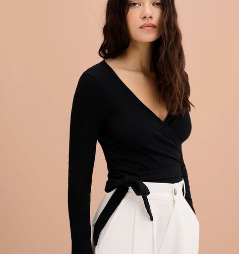 Top It Off: Elevate Your Look with Omnes Fashion Tops Dance Wrap Top, Cotton Wrap Top, Wrap Top Aesthetic, Ballet Fashion Outfits, Ballet Wrap Sweater, Ballet Wrap Top, Black Wrap Top, Ballet Aesthetic, Ballet Top