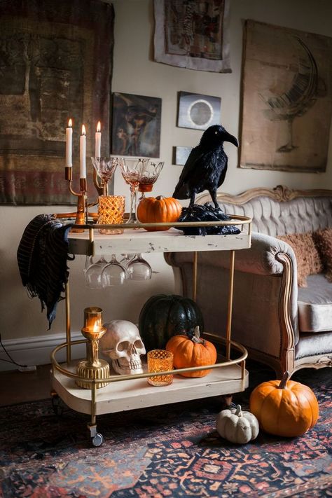 A vintage gothic bar cart styled with eerie yet elegant Halloween decor, perfect for a sophisticated Halloween gathering Halloween Bar Cart Decor, Halloween Bar Decorations, Vintage Bar Cart Styling, Bar Cart Styling Ideas, Classy Halloween Party, Gothic Bar, Halloween Bar Cart, Bar Cart Ideas, Simple Halloween Decor