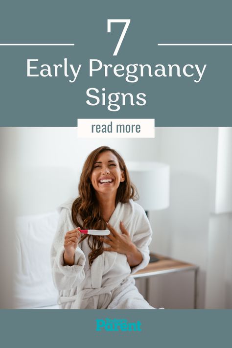 Woman in white robe holding a pregnancy test and smiling while clutcing her heart Sign Of Pregnancy, 4 Weeks Pregnant, Early Signs Of Pregnancy, Concert Signs, Home Pregnancy Test, Early Pregnancy Signs, Early Pregnancy, All About Pregnancy, Face Care Routine