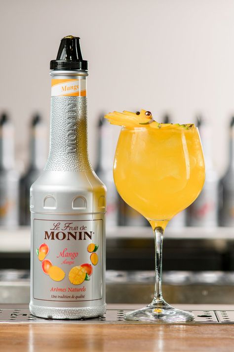 Enhance your drink experience with Monin Mango Puree Syrup. Made from the finest mangoes, this syrup adds a tropical and sweet twist to your favorite beverages. Perfect for cocktails, smoothies, and iced teas. Elevate your drinks to new heights with Monin. Caramel Apple Popcorn, Popcorn Tub, Apple Popcorn, Popcorn Seasoning, Mango Puree, Candy Floss, Cinnamon Sugar, Caramel Apples, Iced Tea