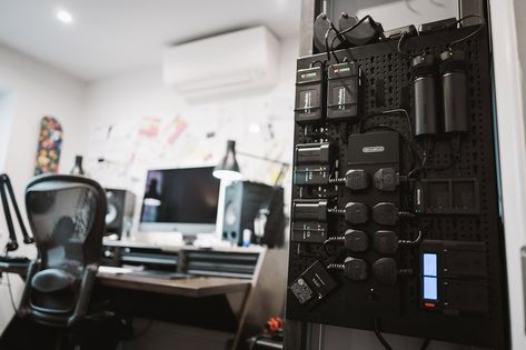 How I Built a Custom Charging Board for All of My Camera Batteries | PetaPixel Battery Charger Station, Camera Gear Storage, Battery Charging Station, Steel Pegboard, Photography Cameras, Photography Office, Camera Storage, Man Cave Office, Music Studio Room