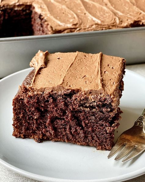 Slice of Aunt Doris's Chocolate Cake on plate with fork, rest of cake in pan in background Chocolate Zucchini Cake Recipe, Mocha Buttercream, Brown Eyed Baker, Chocolate Zucchini Cake, Rich Chocolate Cake, Fudge Cake, Chocolate Zucchini, Unsweetened Chocolate, Dump Cake Recipes