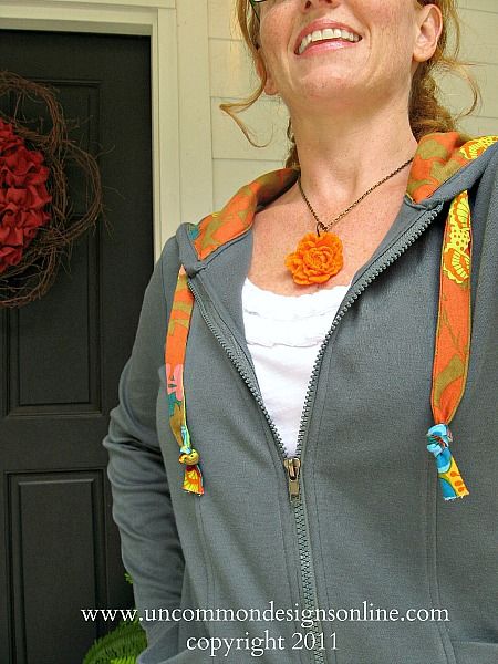 Adorable sweatshirt update with beautiful fabric! Take a plain hoodie up a notch and create this fun and stylish fabric lined hoodie. #sewing #fabric #annamariahorner #hoodie #refashion Upcycle Zip Up Hoodie, Add Lace To Sweatshirt, Upcycled Hoodie Sweatshirt Refashion, Decorating Sweatshirts Diy, Hoodie Makeover Diy, Sweatshirt Alterations Ideas, Hoodie Upcycle Diy Sweatshirt Refashion, Sweatshirt Makeover Diy, Hoodie Diy Upcycle