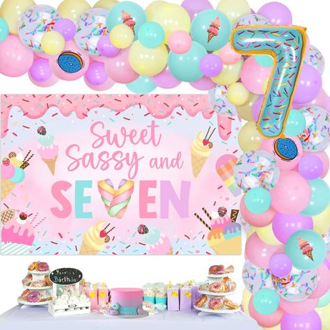 PRICES MAY VARY. Sweet sassy and seven: Our Sweet 7th Birthday decorations will create a magical and memorable birthday party for your little girl. The vibrant colors and sweet designs will make her feel like a princess on her special day. Donut ice-cream theme: The theme of our party decorations is centered around delicious donuts. The sweet sassy and seven backdrop features a colorful donut design with the words "Sweet, Sassy, and Seven" in bold letters. The donut balloons are also a great add 7 Is Sweet Birthday, Ice Cream And Donuts Birthday Party, Donut Bday Party Ideas, Birthday Party Themes For Girls Age 7, 7th Birthday Girl Themes, Birthday Party Ideas For 7 Year Girl, Seven Birthday Theme, 7th Girl Birthday Party Ideas, Sweet Treat Birthday Party Theme