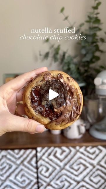 Erin Kyles on Instagram: "Nutella stuffed chocolate chip cookies! 🍪 

Because why have regular chocolate chip cookies when you can stuff them with *more* chocolate. They’re made with brown butter for a toasty, delicious flavor throughout the dough and are loaded with hazelnuts and pools of chocolate. Aaand as always, they’re small batch - yielding 8 delicious cookies. 

🍪 you can find the full recipe on my blog, 🔗 in my bio, or search up “fresh bean bakery nutella stuffed chocolate chip cookies”!" Stuffed Chocolate Chip Cookies, Stuffed Cookies, Delicious Cookies, Brown Butter, Yummy Cookies, Small Batch, Small Batches, Hazelnut, Chip Cookies