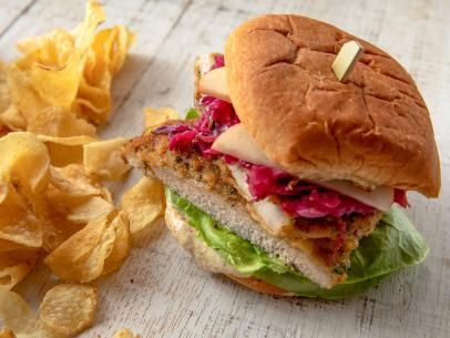 Pork Schnitzel Sandwich Recipe | Ree Drummond | Food Network Pork Schnitzel Sandwich, Schnitzel Sandwich Recipe, Schnitzel Sandwich, Salt And Vinegar Potatoes, Pork Schnitzel, Bean Burgers, Potato Roll, Weekend Dinner, Cheese Steak