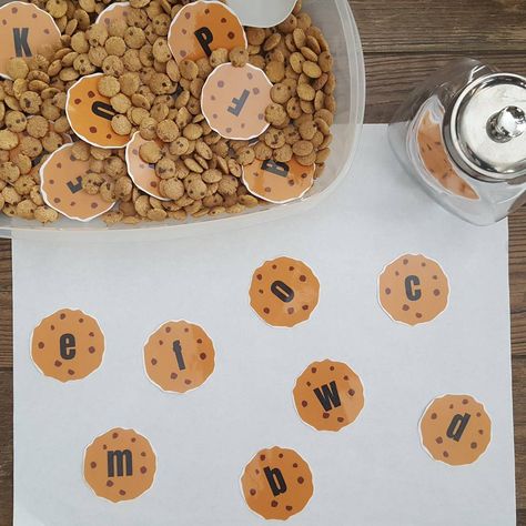 Cookie Sensory Bin I placed Alphabet Cookies in a bin of cookie cereal. Little guy grabbbed out the uppercase letter & matched it to the… Cookie Activities For Preschool, Cookie Sensory Bin, If You Give A Mouse A Cookie Activities, Cookie Cereal, Playing Preschool, Literacy Preschool, Aba Activities, Letter C Activities, Prek Homeschool