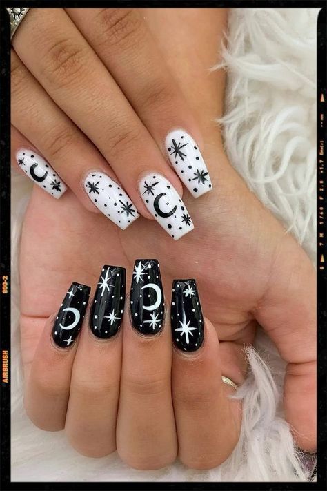 Black Acrylic Nails With Moon And Stars, Moons And Star Nails, Moon And Stars Nails Art, Moon And Star Acrylic Nails, Black And White Moon And Stars Nails, Black Nail Designs Moon And Stars, Moon And Star Nails Acrylic Black, Moon On Nails Art Designs, Black And White Moon Nails