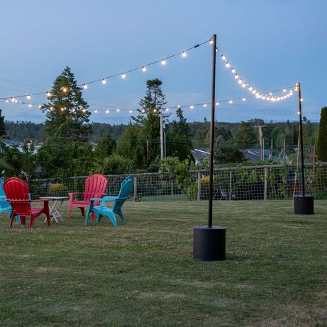 Black Steel String Light Pole with Tank Base - World Market Yard String Lights, Grass Patio, Backyard String Lights, Outdoor String Lights Patio, Diy String Lights, Hanging String Lights, Pole Stand, Tank Stand, Patio String Lights