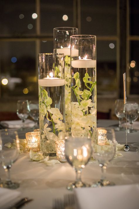 Submerged Flower Centerpiece, White Orchid Centerpiece, Budget Friendly Wedding Centerpieces, Submerged Flowers, Floating Candles Wedding, Beautiful Wedding Centerpiece, Floating Candle Centerpieces, Elegant Wedding Centerpiece, Orchid Centerpieces