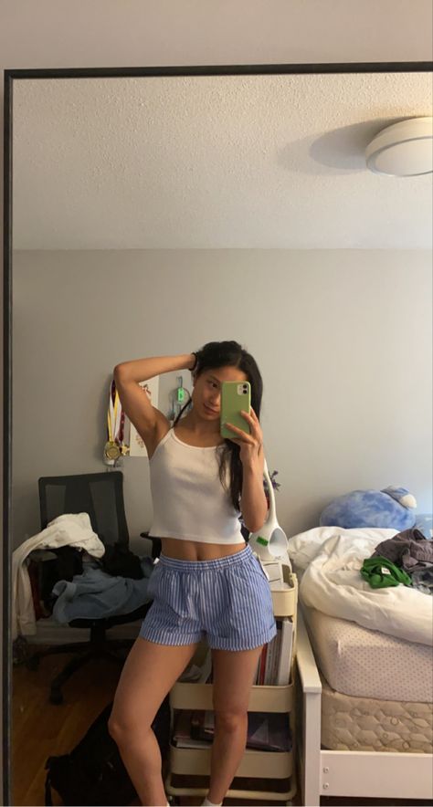 Striped boxer shorts and white tank top outfit in a mirror selfie Guy Shorts Outfit Women, Polo Boxers Women, Mens Boxers As Shorts For Women, Boxer Outfit Aesthetic, Summer Outfits Boxer Shorts, White Boxers Outfit, Female Boxer Shorts, Men Boxers Outfit Women, Linen Boxer Shorts Outfit