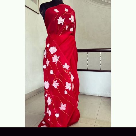 White magnolias handpainted on a red organza saree. Red Organza Saree, Hand Painted Sarees, Shade Of Red, White Magnolia, Red Saree, Organza Saree, Satin Blouse, Audrey Hepburn, Shades Of Red