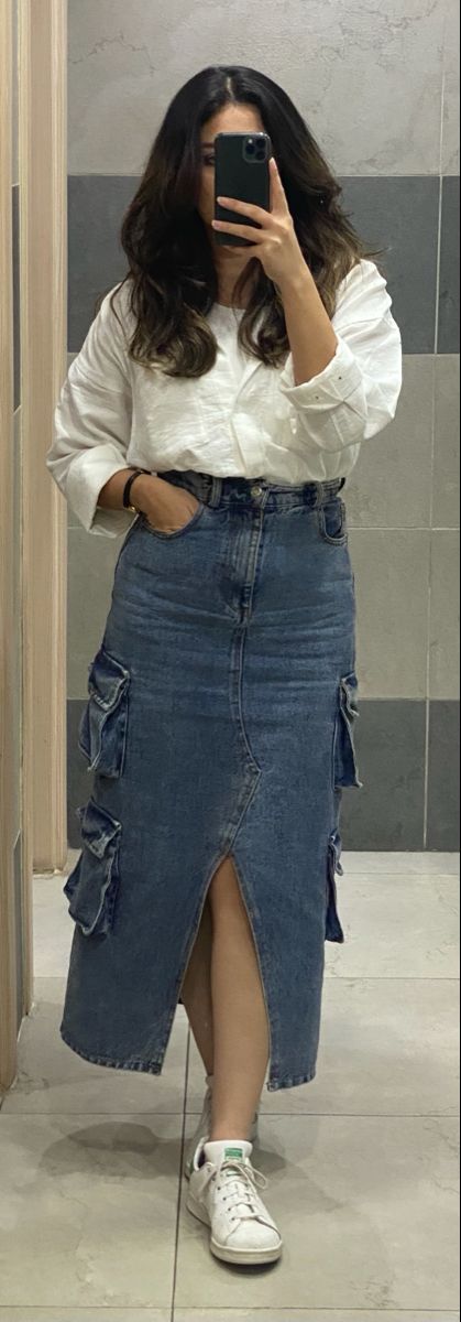 White shirt and a denim midi skirt and a white sneakers combo for work today White Long Jeans Skirt Outfit, White Shirt And Denim Skirt, Long Jeans Skirt Outfit, Shirt And Denim Skirt, Demin Skirt Outfit, Long Denim Skirt Outfit, Long Jeans Skirt, Jean Skirt Outfits, Long Jean Skirt