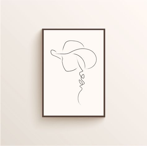 Here is the first poster that I present to you. It is called “Braided Cowgirl” on the website!  When we are young in horse events, this style is pretty much everyday style. I mean the cowboy hat and the braid on the side. And then, we grow up and realize that we CANNOT drive with that 🤣   Available on www.wallwest.ca Line Art Cowgirl, Cowgirl Outline Tattoo, Line Art Cowboy Hat, How To Draw A Cowboy Hat Easy, Cowboy Hat Line Drawing, Cowgirl Line Drawing, Cowgirl Outline Drawing, Cowgirl Drawing Simple, Cowboy Hat Line Art