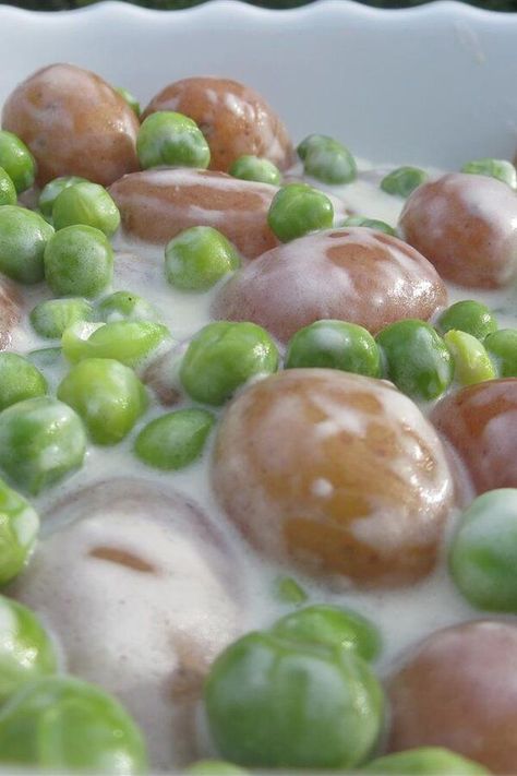 Creamed Peas and New Potatoes | "This recipe was a perfect rendition of the old time dish my grandma used to make me growing up on the farm." #sidedishrecipes #sides #dinnersidedish #sidedishes #sidedishideas #potatoes #potatorecipes #potatosidedish Peas And New Potatoes, Potatoes And Peas Recipe, Vegetable Potato Soup, Creamed Peas And Potatoes, Potato Recipes Crockpot, Spring Potato, Potatoes And Peas, Yummy Vegetable Recipes, Fresh Peas