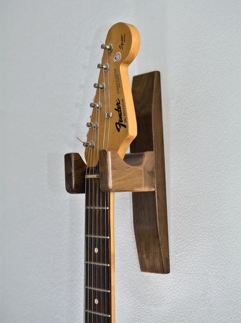 Mounted Guitar, Wood Guitar Stand, Guitar Holder, Guitar Wall Hanger, Padauk Wood, Chair Woodworking Plans, Walnut Wall, Guitar Rack, Wood Guitar