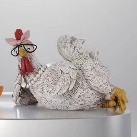 PRICES MAY VARY. Modern & Farmhouse Decor: Add a touch of sophistication to modern or farmhouse interiors with this elegant Chicken Figurine. Complements existing decor for a harmonious aesthetic. Lifelike Design: Designed with intricate details, this Chicken Figurine in Synthetic Resin captures the essence of realism. Perfect for enhancing your space as a toy or table decoration. Versatile Use: Ideal for various settings, including living rooms, bedrooms, offices, windowsills, gardens, and more