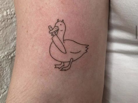 Goose Holding A Knife Tattoo, Small Funny Animal Tattoos, Cute Animal With Knife Tattoo, Goose Knife Tattoo, Duck Holding Knife Tattoo, Cartoon Duck Tattoo, Silly Tattoos Funny, Funny Duck Tattoo, Animals With Knives Tattoos