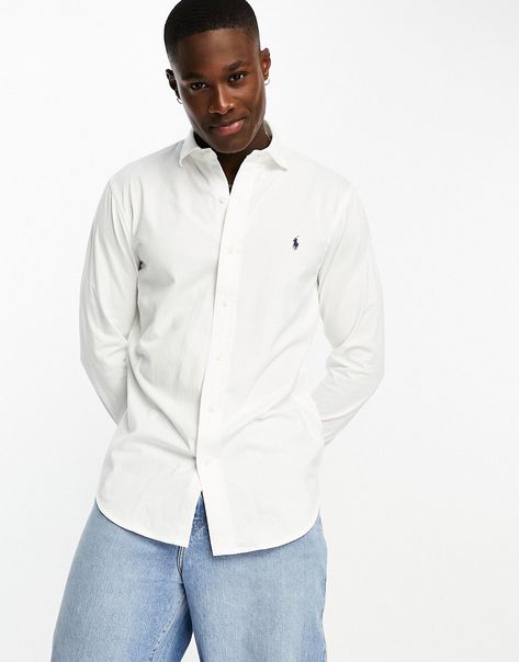 Shirts by Polo Ralph Lauren Waist-up dressing Spread collar Button placket Logo embroidery to chest Long sleeves Regular fit Open with care – product may be pinned Short Men Fashion, En Pointe, Marken Logo, Sport Shirt, Plain Shirts, Camisa Polo, Logo Embroidery, Mens Polo Shirts, Body Fit