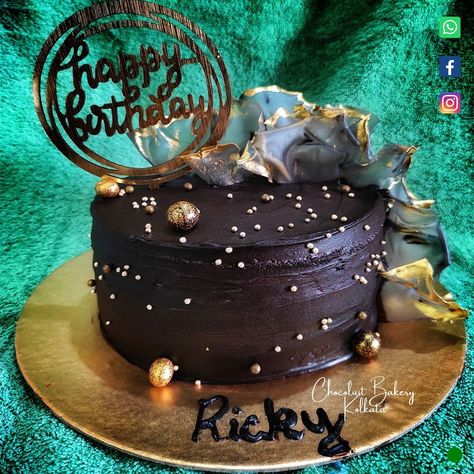 Chocolate truffle cake decorated with chocolate balls and rice paper sails coloured in grey and gold colour Pure eggless Customise cake with us Location - kolkata Home delivery available To book Whatsapp / call - 9874440623 #chocolustbakerykolkata #kolkatahomebaker #kolkatabakery #kolkatahomebakery #homebaker #customisedcakeskolkata Dutch Truffle Cake Designs, Choco Truffle Cake Designs, Truffle Cake Designs, Chocolate Truffle Cake Designs, Sail Cake, Rice Paper Sails, Choco Truffle Cake, Chocolate Birthday Cake Decoration, Choco Truffle