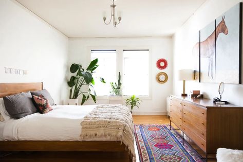 Avoid these bedroom design mistakes to make your sleep space a happier place. Rugs Layout, Banana Plant, Spanish Style Home, Eclectic Bedroom, Spanish Style Homes, Wooden Floors, 아파트 인테리어, Mediterranean Home, Bedroom Decorating