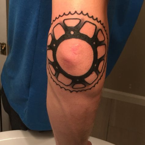 Sprocket tattoo elbow tattoo Elbow Tattoo Men Back Of, Elbow Ditch Tattoo Ideas, Crook Of Elbow Tattoo, Tire Tattoo, Elbow Pit Tattoo, Sprocket Tattoo, Elbow Crook Tattoo, Gear Head Tattoo Ideas, Elbow Tattoo Men