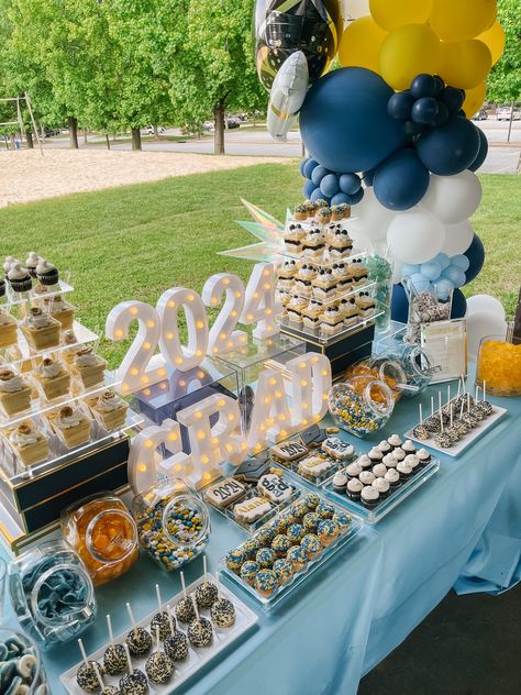 🍭 Looking for unique candy bar ideas for your grad party? From personalized candy displays to themed dessert tables, find inspiration to make your event stand out. Read our latest blog post now! 🎉 #GradParty #CandyBuffet #DessertIdeas #PartyInspo #EventDecor #SweetTreats Candy Bar Ideas For Graduation, Blue And Yellow Graduation Party Ideas, Graduation Open House Decorations, Graduation Display Table, Safari Party Foods, Candy Bar Ideas, Dessert Table Graduation, Graduation Brunch, Graduation Party Desserts