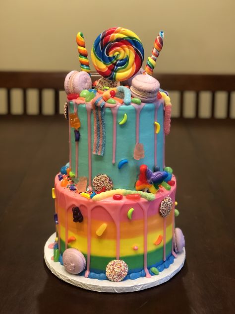 It’s a loaded candy cake for a birthday celebration! 🍭🌈🍬 This two-tiered white cake is decorated with buttercream frosting, white chocolate drip, macarons, and assorted candy. Taste and see that the Lord is good! Thanks for allowing Cristin to serve you! Sweetie Birthday Cake, White Chocolate Drip, Candy Birthday Cakes, Tiered Cakes Birthday, Chocolate Drip Cake, Two Tier Cake, Wilton Cake Decorating, Cake Supplies, Candy Cakes