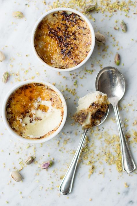 Pistachio Creme Brulee would be a great dessert to wow your guests. Creamy and… كريم بروليه, Classic French Desserts, Creme Brulee Recipe, Brulee Recipe, Custard Desserts, Favorite Dessert, K�östliche Desserts, Trifle, Le Creuset