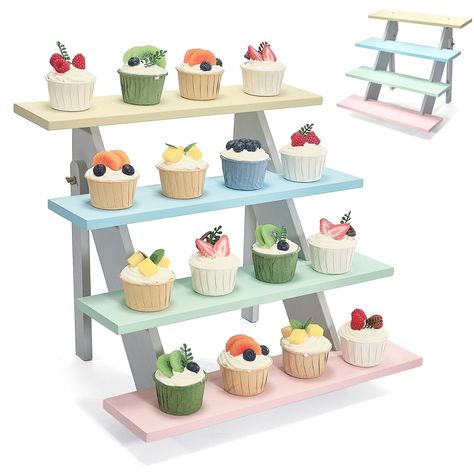 PRICES MAY VARY. UNLEASH YOUR CREATIVE PRESENTATION: Experience the freedom to showcase your desserts and decorative items in style with 4 tier display riser. Impress guests with its stunning color design VERSATILE AND MULTI-FUNCTIONAL: Beyond cupcakes stand, our display risers offer endless possibilities. Use them to showcase snacks at parties, display jewelry, scented candles, figures, or crystal gemstones. The tiered shelves provide a stylish and versatile platform for various items, making i Graduation Table Display, Wooden Cupcake Stands, Tiered Shelves, Graduation Table, Cupcakes Stand, Decoration For Party, Woodwork Projects, Colorful Cupcakes, Display Risers