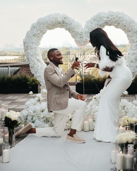 SHE SAID YES! 💍🤍🔐 Congratulations to this sweet couple! 🎉🎉🎉 . For our client, who traveled from the UK!?! We styled an all white proposal on a rooftop overlooking the city of Atlanta. The venue provided the perfect setting for this intimate proposal 🤍🤍🤍 . Proposal packages - link in bio. . Planner & Designer @brownsugahpicnics Marquee Letters @fantasy_fabulousatl Cold Sparklers @ansar_violin Photography @cassieraedsgn Music @salvationsax Venue @poncecityroof . . . . *****When sharing/using ou... All White Proposal, Black Couple Proposal, Atlanta Proposal, White Proposal, Cold Sparklers, Intimate Proposal, Violin Photography, She Said Yes, Marquee Letters