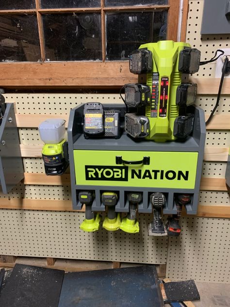 Made this out of scrap wood and used a cricut to make ryobi decal Ryobi Tools Garage, Ryobi Battery Charging Station, Drill Charging Station, Ryobi Link, Battery Charging Station, Ryobi Battery, Ryobi Tools, Garage Tool Storage, Garage Tools