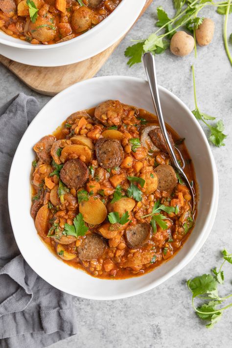 Lentil, potato and sausage stew! This vegan lentil stew is so hearty and perfect for winter. Packed with spice and rich umami-flavor. Lentil Potato, Potato And Sausage, Sausage Stew, Vegan Stew, Vegan Lentil, Vegetarian Soup Recipes, Stewed Potatoes, Vegan Soup Recipes, Lentil Stew