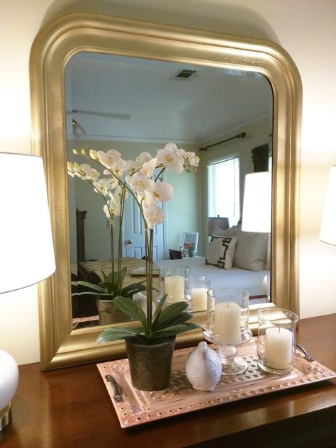 In the midst of the back-to-school chaos, @katmwilkerson managed to get one thing done that she'd been thinking about for a while. She painted the bedroom mirror. No wonder she wasn't crazy about it before--it wasn't gold! Rustoleum Metallic Gold and a little prep work fixed that! http://www.rustoleum.com/en/rustoleum/product-catalog/consumer-brands/specialty/metallic-spray Gold Paint For Mirror Frame, How To Paint A Mirror Frame Gold, Gold Spray Paint Diy, Spray Paint Mirror, Best Gold Spray Paint, Mirror Spray Paint, Painting Mirror Frames, Rustoleum Metallic, Spray Paint Wood