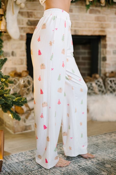 Plan on staying in a lot this holiday season? Or at least plan on staying with family and friends for Christmas eve? Then these pajamas are perfect for you! They are so cute and totally comfy! These classic pjs are going to have you feeling festive and fun this holiday season! Top Collared neckline Button down front closure Long sleeves Hot pink piping Holiday gingerbread pattern Generous stretch Bottoms Elastic waist Holiday gingerbread pattern Generous stretch *These run large. You may conside