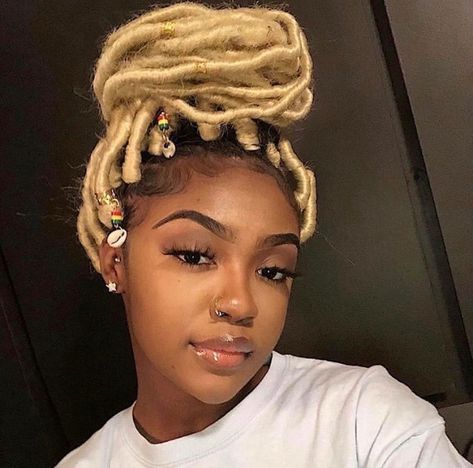 Blonde faux locs on brown skin Blonde Faux Locs, Blonde Dreadlocks, Twisted Hair, Hot Hair Colors, Faux Locs Hairstyles, Girls Braids, Hair Laid, Locs Hairstyles, Box Braids Hairstyles