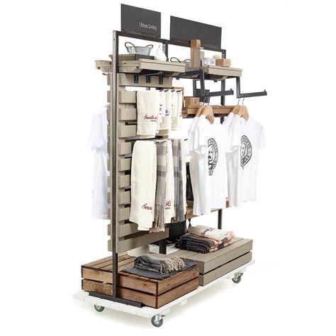 T Shirt Hanging Display, Shirt Rack Display, Retail Apparel Display Ideas, Church Merch Display, Merch Display Ideas, T Shirt Display Ideas Retail, Rustic Retail Store Design, Apparel Display, Merch Display