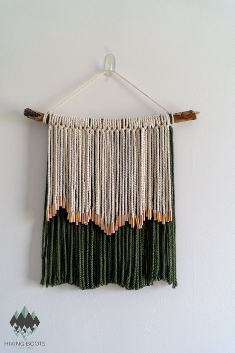 Add a touch of boho-chic elegance to your home with this exquisite macrame wall hanging, thoughtfully crafted from a natural tree branch, recycled natural-colored cotton cord, deep forest-green yarn, and adorned with gold tube beads. - Features:     - Natural Tree Branch: This piece is truly unique and showcases the organic beauty of nature. This branch was saved from being sent to a landfill!     - Eco-Friendly Materials: Made with recycled cotton cord, offering a sustainable and stylish decor Macrame Yarn Wall Hanging, Gnome Crafts, Boho Tree, Macrame Yarn, Yarn Hanging, Green Yarn, House Vibes, Hanging Ideas, Yarn Wall