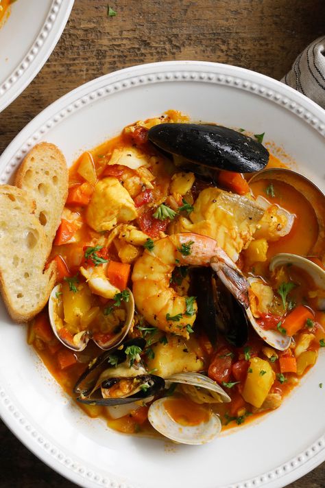 Mark Bittman’s Bouillabaisse Recipe - NYT Cooking Bouillabaisse Recipe, Seafood Stew Recipes, Mark Bittman, Fish Bones, Seafood Stew, Seafood Soup, Nyt Cooking, Fish Dishes, Seafood Dishes