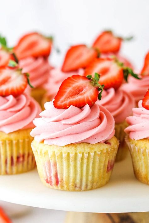 These Fresh Strawberry Cupcakes are soft, fluffy, moist and delicious! There are pieces of chopped strawberry in the cupcake and pureed strawberries in the frosting. #cupcakes #strawberrydessert #strawberrycupcakes #freshstrawberries #homemadecupcakes #homemadestrawberrycupcakes Fresh Strawberry Cupcakes, Strawberry Cupcake Recipes, Cake Mix Cupcakes, Strawberry Dessert Recipes, Strawberry Cake Recipes, Dessert Dips, Strawberry Cupcakes, White Cake Mixes, Strawberry Cakes