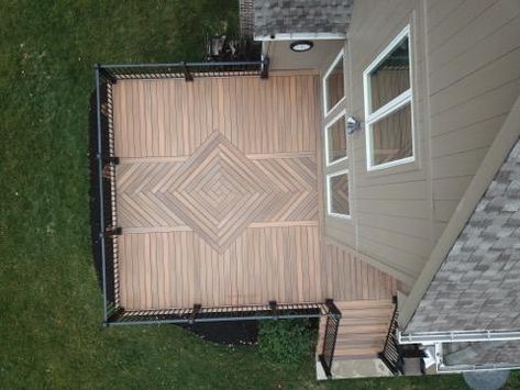 Sometimes perspective can be everything! Milbourn Construction LLC used Fiberon Ipe to create this detailed focal point and beautiful deck. Mixing colors is a great way to add interest and visual focal points to your deck project. See more inspiration on our gallery! Diagonal Decking Design, Deck Pattern Ideas, Decking Designs Layout, Decking Pattern Ideas, Chevron Decking, Deck Inlay Designs, Deck Patterns Design, Composite Deck Ideas Layout, Deck Flooring Ideas