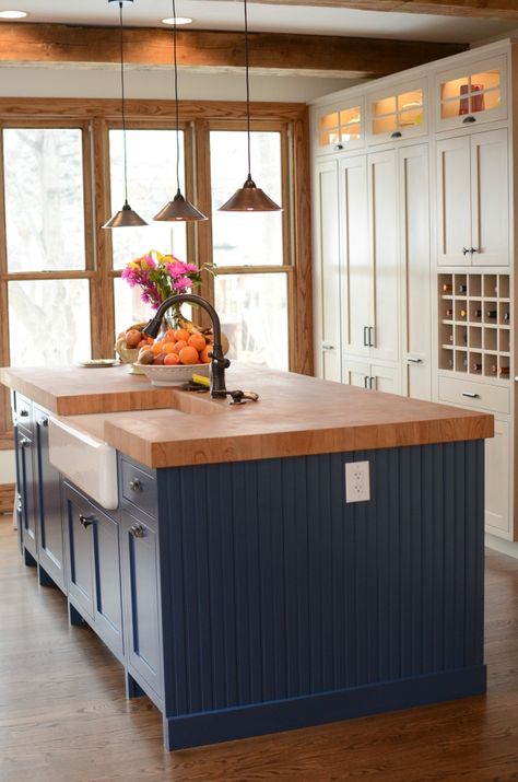 love the blue and the wood Lake House Kitchen Blue Cabinets, Kitchen Island By Window, Dark Blue Kitchen Cabinets Wood Counter, Wood Trim Kitchen Window, Kitchens With Wood Trim, Kitchen Blue White Wood, Blue And Wood Kitchen Ideas, Dark Trim Kitchen, Blue And Wood Interior Design