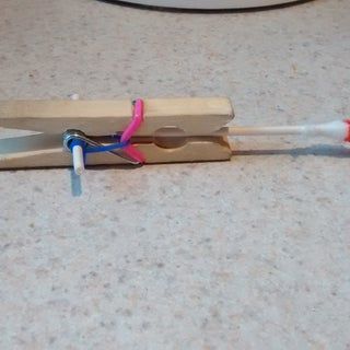 Easiest Ever Kids DIY Mini Crossbow : 8 Steps - Instructables How To Make A Mini Bow And Arrow, Mini Crossbow, Cross Bow, Clothes Pegs, Diy Cross, Cotton Buds, Mini Bows, Activity Days, Crossbow