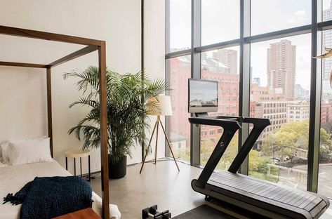 A treadmill in the corner of a bedroom Treadmill In Bedroom, Peloton Room Ideas, Workout Corner, Peloton Tread, Peloton Room, Gym Treadmill, Home Gym Essentials, Bedroom Gym, Workout Room Home