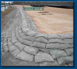 NR 83994) is a high strength 4000 PSI blend of sand and cement packaged in heavy duty natural jute (burlap) bags used to install running-bond retaining ... Concrete Bags Retaining Wall, Rip Rap Retaining Wall, Cement Bag Retaining Wall, Concrete Bag Retaining Wall, Concrete Bags, Concrete Retaining Walls, Landscaping Retaining Walls, Driveway Landscaping, Hillside Landscaping